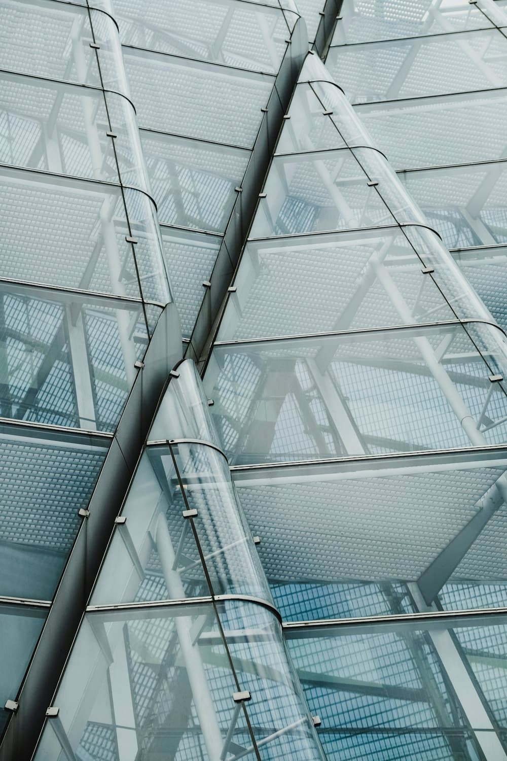 Structural glass and aluminium framing seen from below